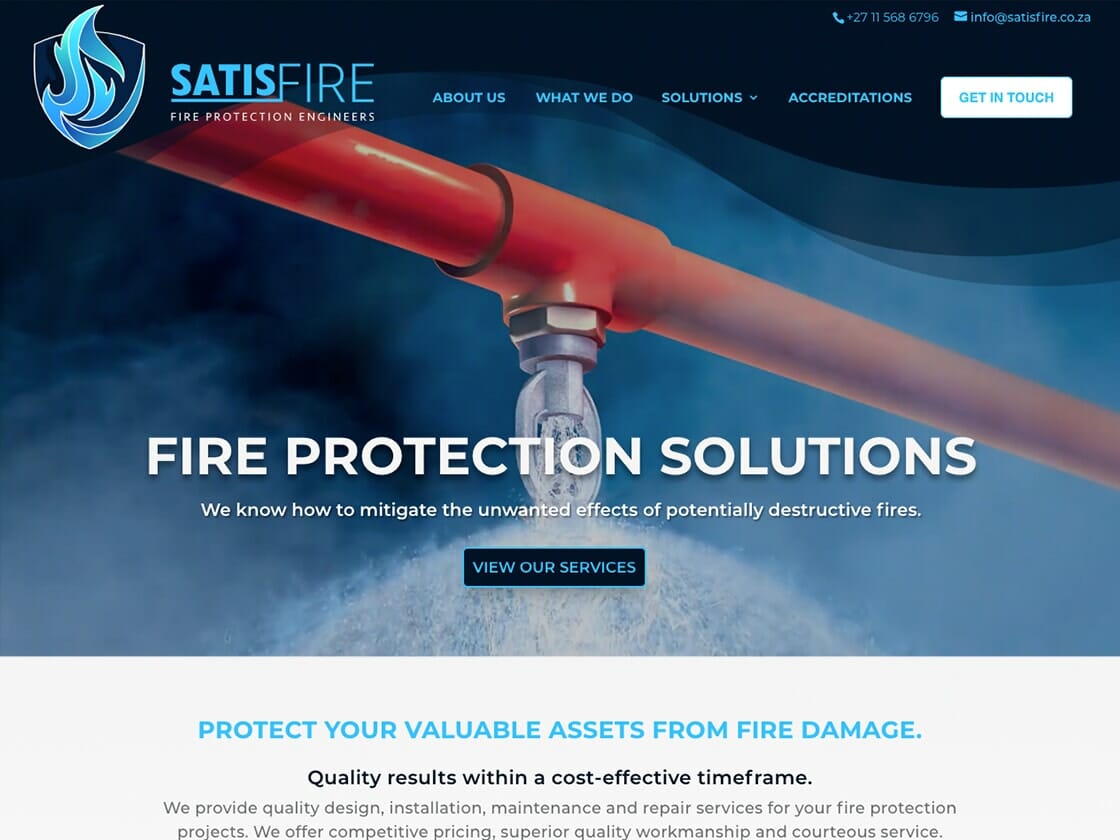 A screenshot of the Satisfire fire protection company’s website homepage featuring a banner with the text “fire protection solutions” and a call-to-action button labeled “view our services. A screenshot of the Satisfire fire protection company's website homepage featuring a banner with the text "fire protection solutions" and a call-to-action button labeled "view our services.