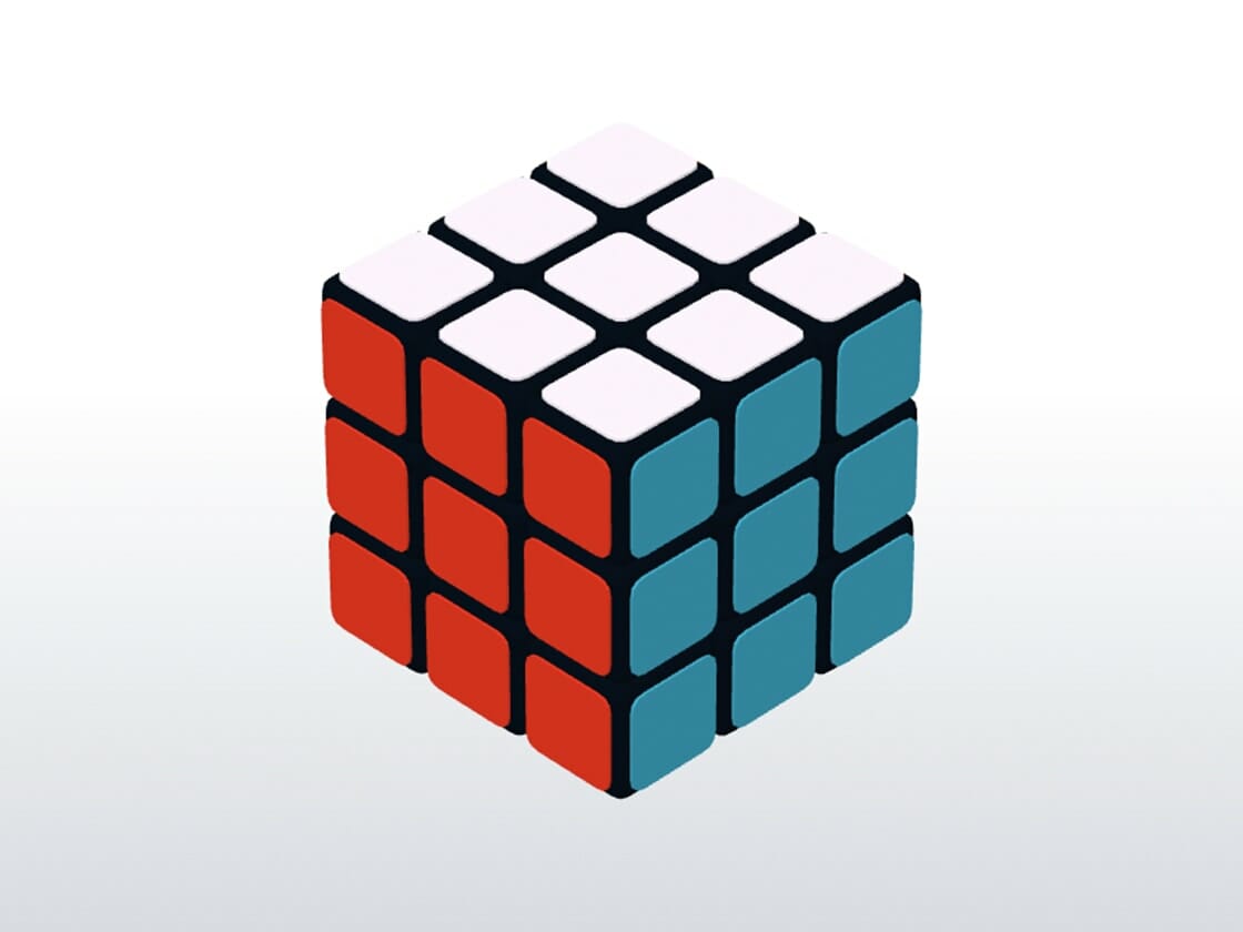 A 3x3 rubik's cube with a solved top face and mixed colors on the other visible faces.
