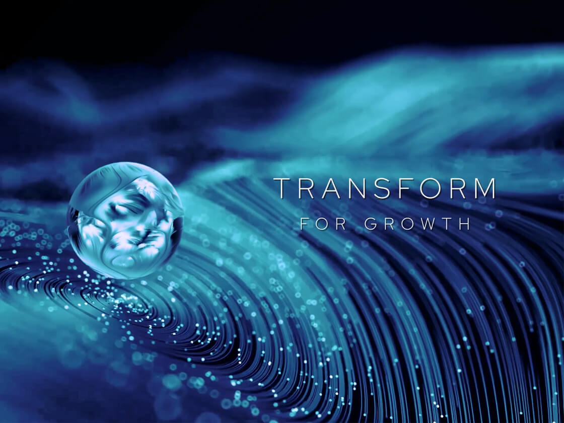 Aspire-Strategize-Transform-Digitize A digital art piece showing a blue, futuristic sphere floating above swirling, luminous wave patterns made of light streaks. To the right of the sphere, the text "TRANSFORM FOR GROWTH" is displayed in uppercase white letters. The background is predominantly dark blue and black.